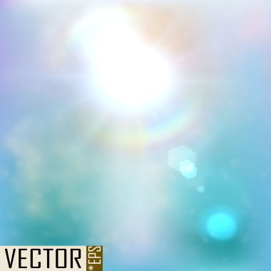 Bright sun on blue sky background