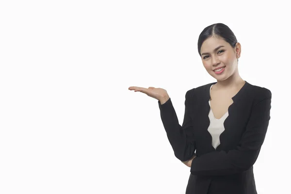Business woman show something isolated on white background, asia — Stock Photo, Image