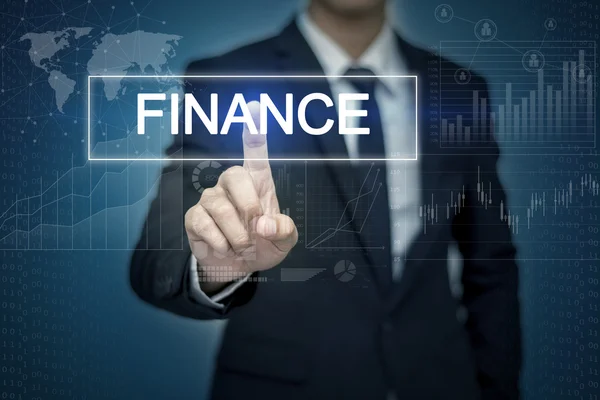 Biznesmen rękę dotykając finanse przycisk na ekranie wirtualnych — Zdjęcie stockowe