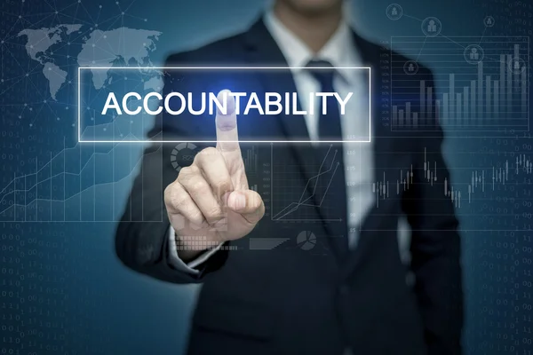 Businessman hand touching ACCOUNTABILITY  button on virtual scre — Stock Photo, Image