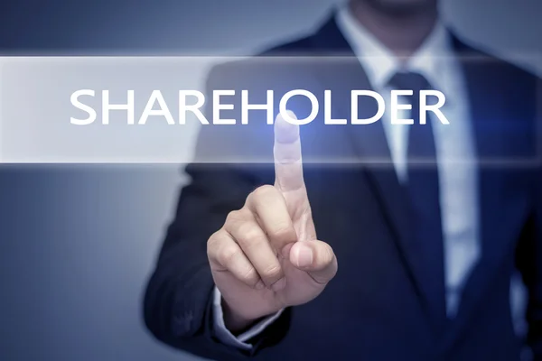 Podnikatel ruka se dotýká akcionář tlačítko na virtuální obrazovky — Stock fotografie