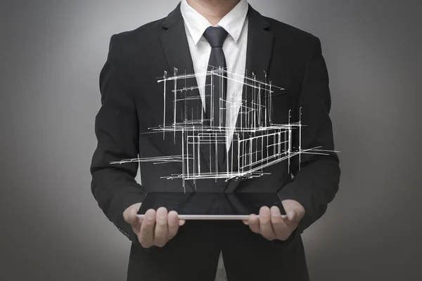 Empresário mostrando um modelo da casa — Fotografia de Stock