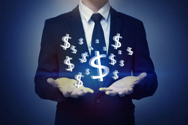 Podnikatel ruka drží peníze, obchodní koncepce — Stock fotografie