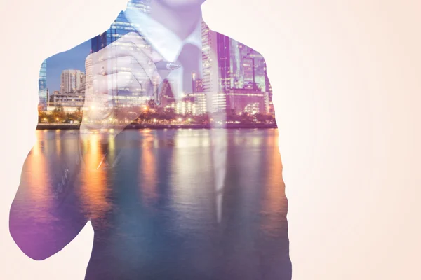 Double exposure of business man and city — Stock Photo, Image