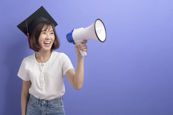 Portrait Graduated Asian Student Holding Megaphone Isolated Purple Background Studio — Stock Photo, Image