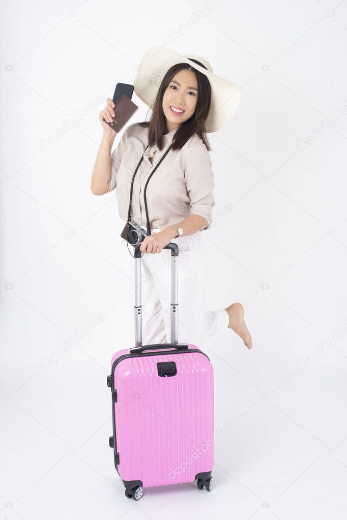 Beautiful Asian woman tourist  on white background