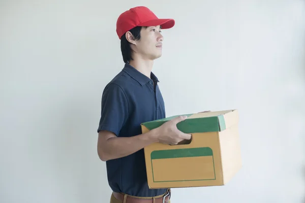 Portrait of an handsome happy delivery man — Stock Photo, Image