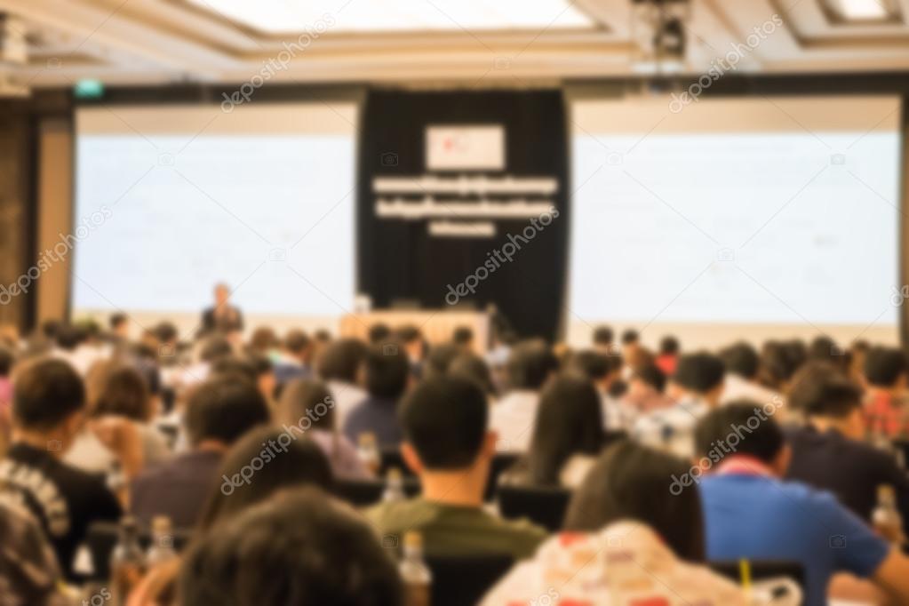 Motion blur of view of seminar with audience in a seminar room