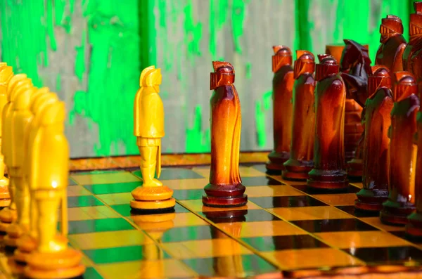 Chess board. wooden figures