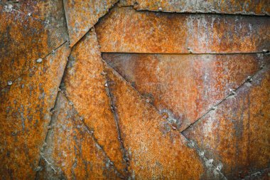 Paslı metal doku arka planı. Metal parçaları kendi aralarında kaynaşmış.