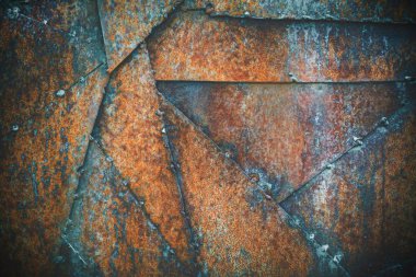 Paslı metal doku arka planı. Metal parçaları kendi aralarında kaynaşmış.