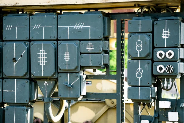 electrical shield, old switchboard. Many different boxes with wires