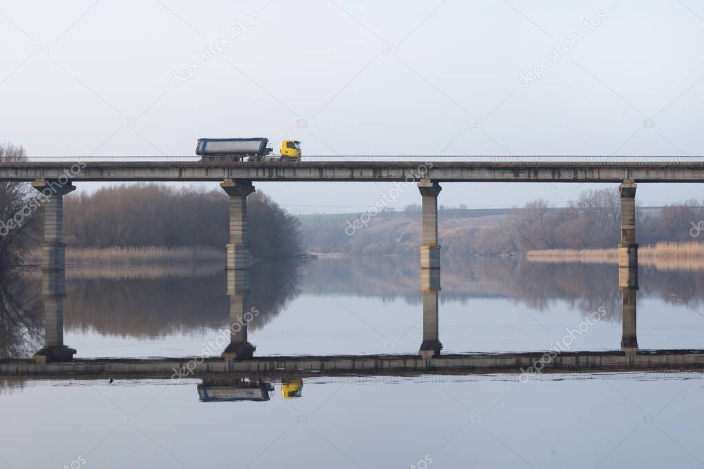 An ordinary concrete bridge over a river