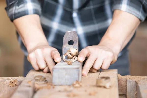 Closeup Carpenter Holding Plane Planing Shaving Piece Wood Clamp — Stock Photo, Image