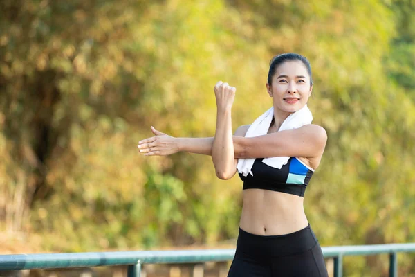 Young Fitness Woman Exercising Stretching Arms Workout Park — Stock Photo, Image