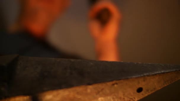 Blacksmith Forging Sword on an Anvil with a HammeLow Angle Slow Motion — Stock Video