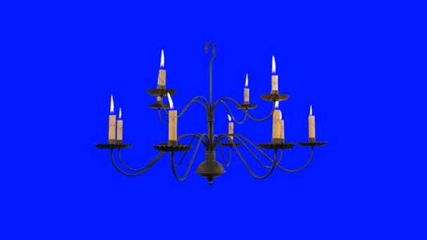 Old Chandelier with Burning Candles on a Blue Background — Stock Video