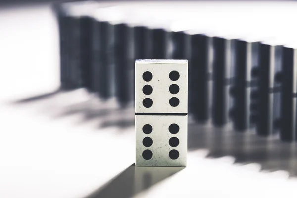 The domino effect of white blocks
