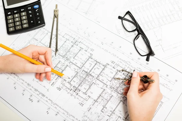 Architect working on blueprint — Stock Photo, Image