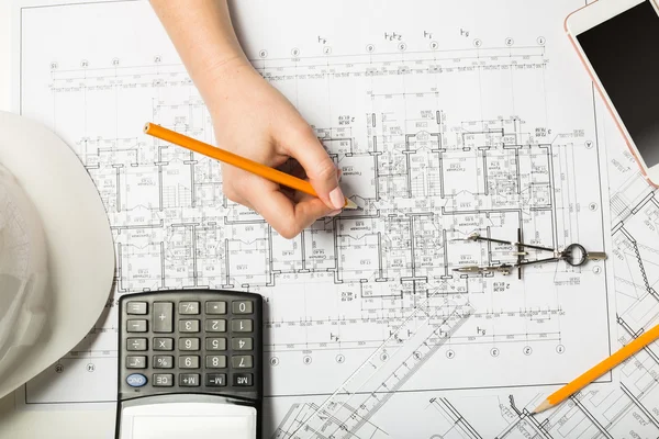 Architect working on blueprint — Stock Photo, Image