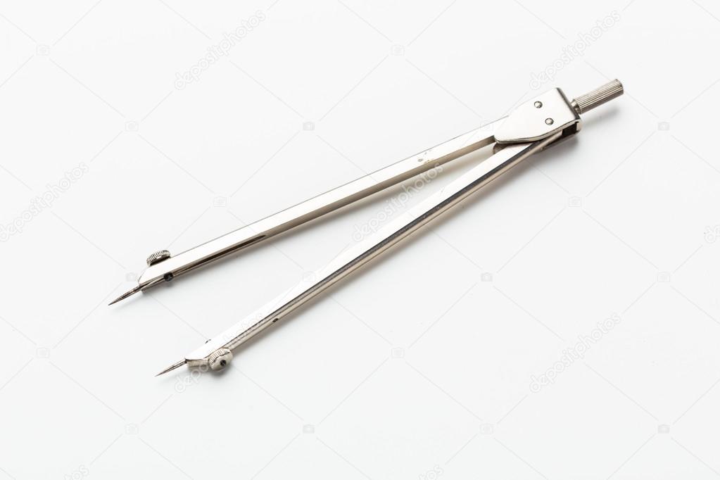 Student metal compasses for drawing lessons Stock Photo by ©Fotofabrika