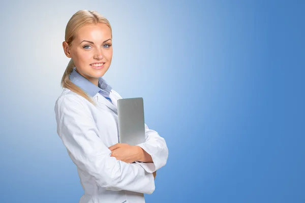 Smiling doctor woman in medical gown — Stock Photo, Image