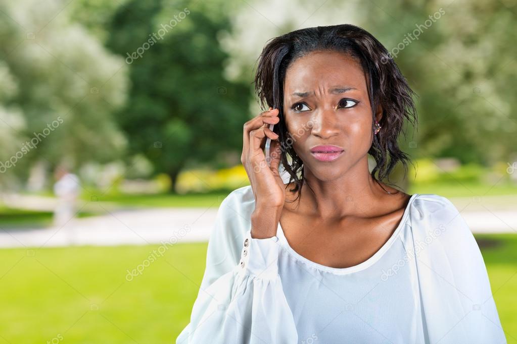 african woman talking on the phone