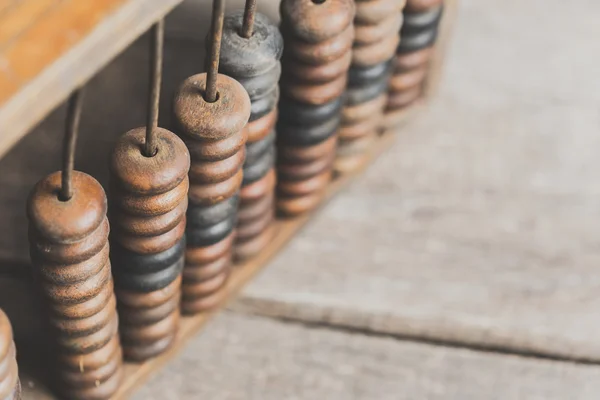 Abacus vintage sobre fondo de madera — Foto de Stock