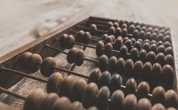 Abacus vintage sobre fondo de madera — Foto de Stock