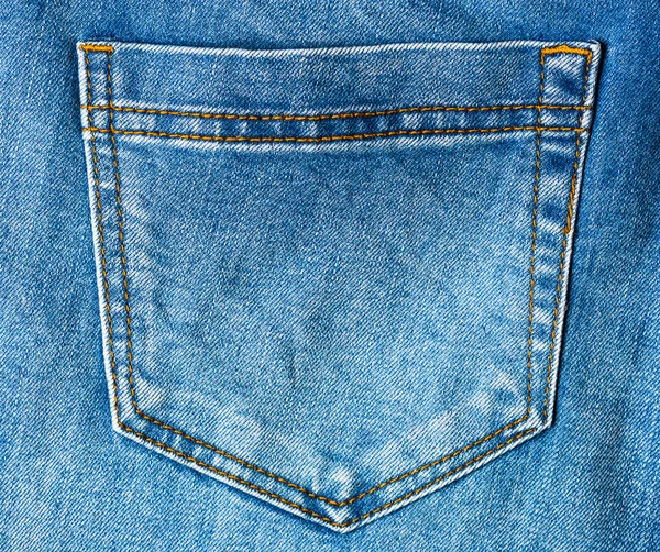 Calça jeans azul na superfície de madeira velha — Fotografia de Stock