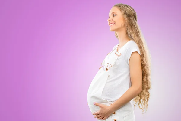 Junge schwangere Frau — Stockfoto