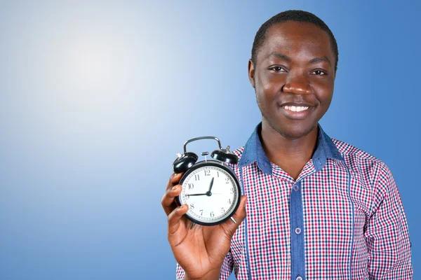 Afrikansk man med klocka — Stockfoto