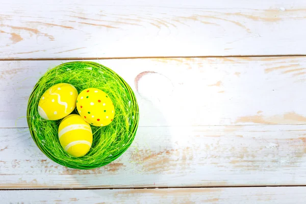 Easter eggs on wooden background — Stock Photo, Image