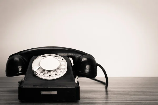 Retro telephone on table — Stock Photo, Image