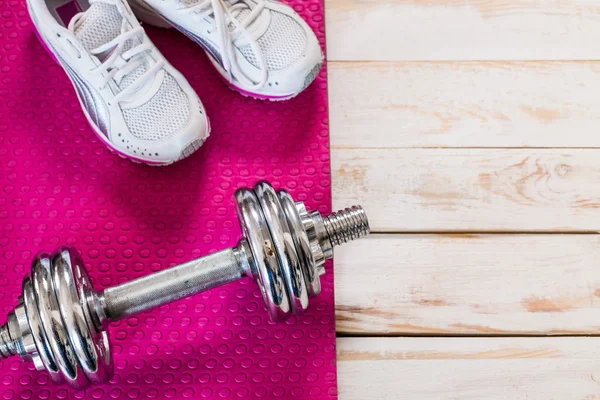 Set for sports activities on tiled floor — Stock Photo, Image