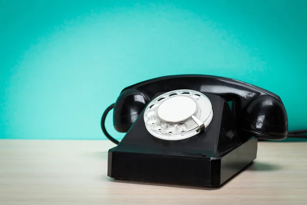 Retro telephone on table — Stock Photo, Image