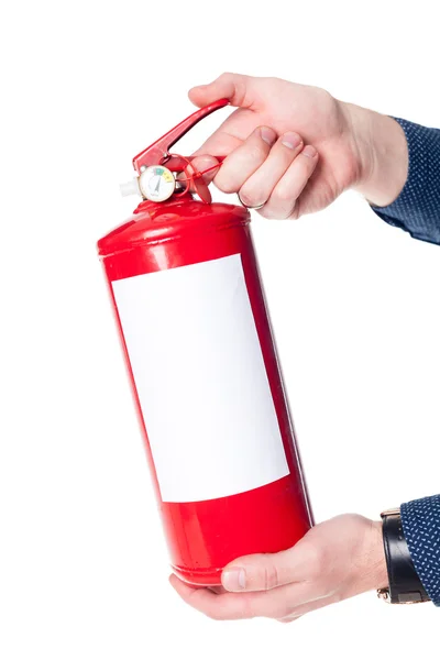 Homem usando extintor de incêndio — Fotografia de Stock