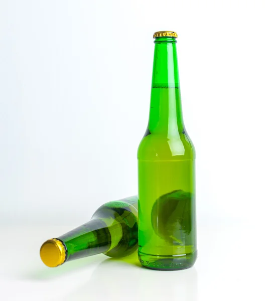 Рядок пляшок пива — стокове фото