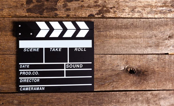 Photo of movie clapper on wood — Stock Photo, Image