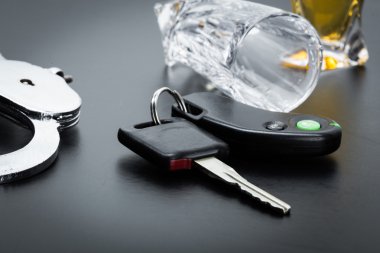 Alcohol and car keys on bar clipart