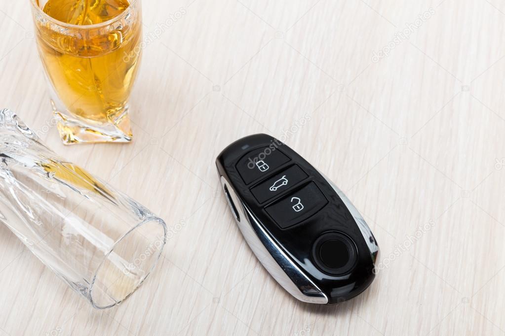 Alcohol and car keys on bar