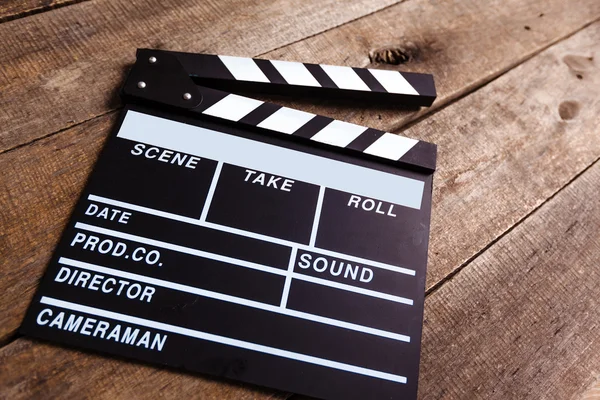 Photo of movie clapper on wood — Stock Photo, Image
