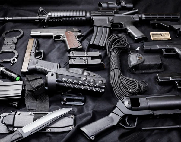 Modern weapon, black background — Stock Photo, Image