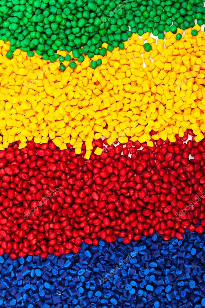 Tinted plastic granulate for injection moulding process — Stock Photo