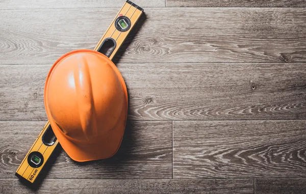 Helmet and measure ruler — Stock Photo, Image