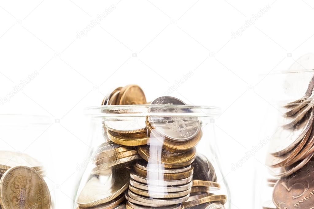 Money jars with coins 