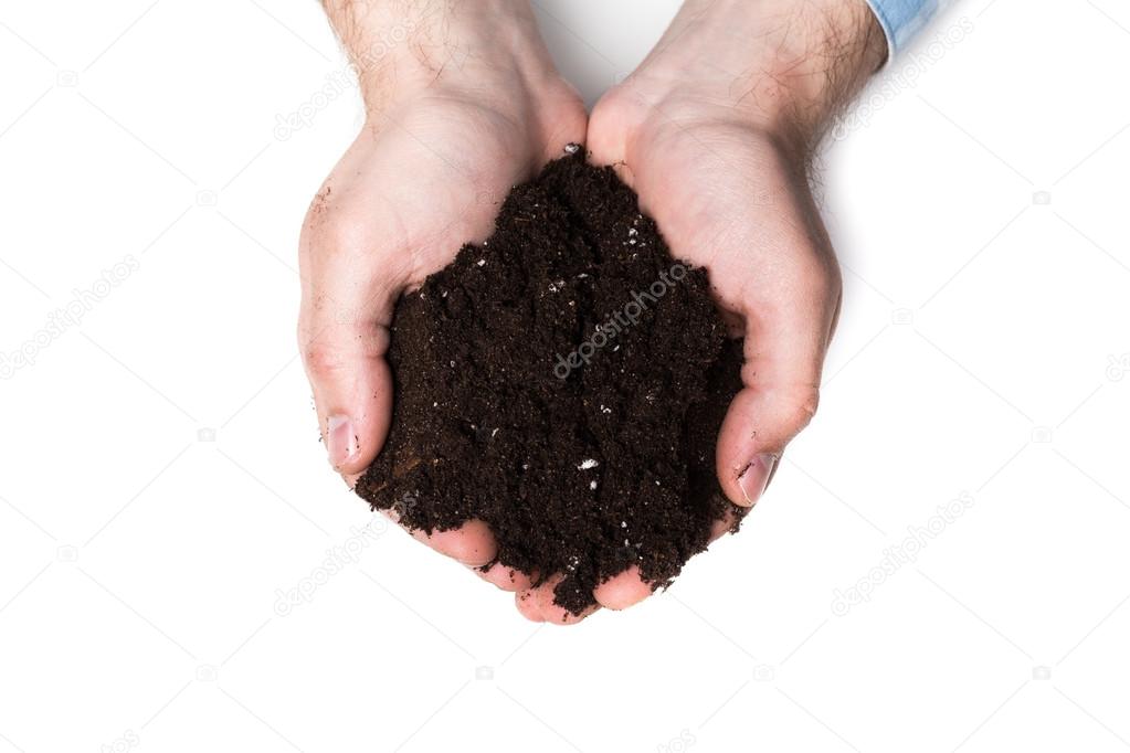 Handful of Rich Brown Soil