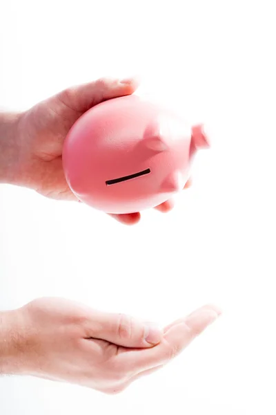 Lege piggy bank in handen — Stockfoto