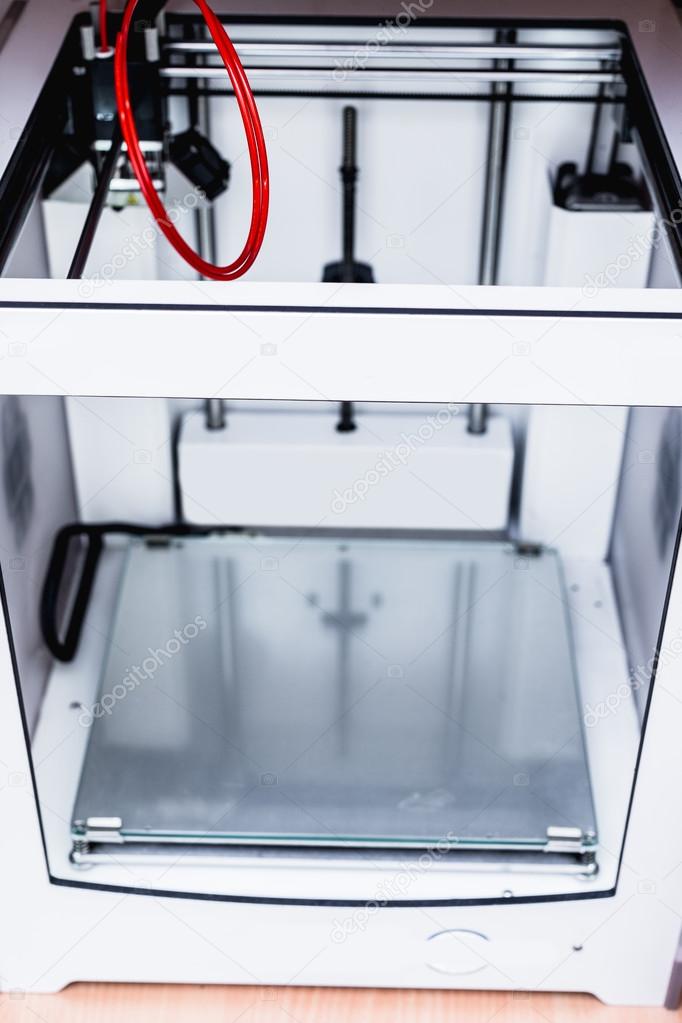 3d printer with red filament