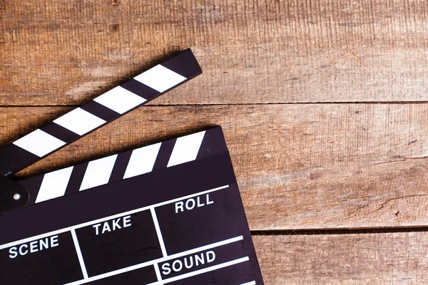 Movie clapper on wooden background — Stock Photo, Image